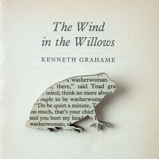 Illustration for article titled Brooches Made From Classic Books Let You Wear Your Favorite Words